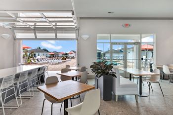 Sprawling indoor/outdoor social club with kitchen & lounges